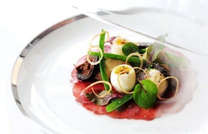 Lightly smoked plate of lamb carpaccio with shallot mousse, pickled walnut and quails eggs