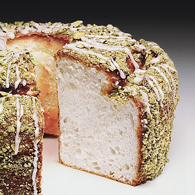 Lime angel food cake with lime glaze and pistachios