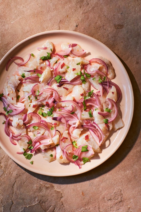 Lime-cured fish with chilli padi and pink onions