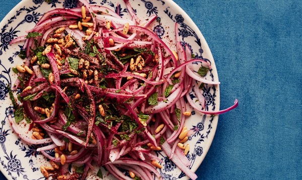Lime-marinated onions with pine nuts and mint