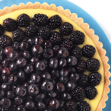 Lime tart with blackberries and blueberries