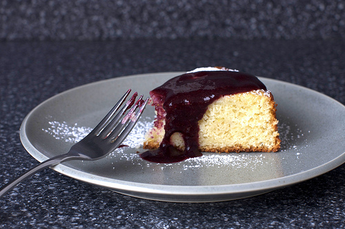 Lime yogurt cake with blackberry sauce