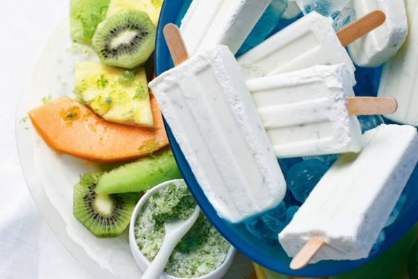 Limoncello & lime popsicles with fruits and sugared lime zest