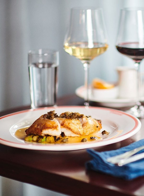 Line-caught fish, lemon and caper beurre noisette and poached asparagus
