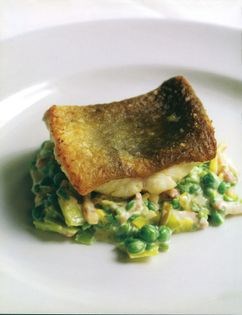 Ling with creamed peas, leeks and bacon