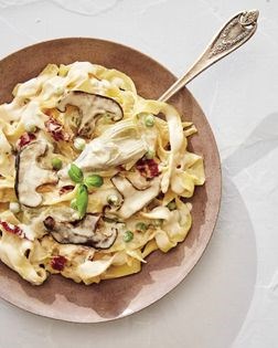 Linguine carbonara with peas, artichokes, and shiitake bacon