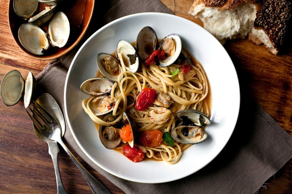 Linguine with littlenecks, roasted tomatoes and caramelized onions
