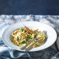 Linguine with shaved parsnips, spinach and pine nuts