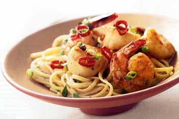 Linguine with shrimp and scallops in Thai green curry sauce