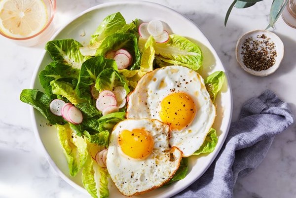 Little gem salad with fish sauce vinaigrette & fried eggs 