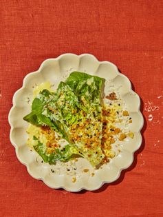 Little gems Caesar with challah bread crumbs & black sesame