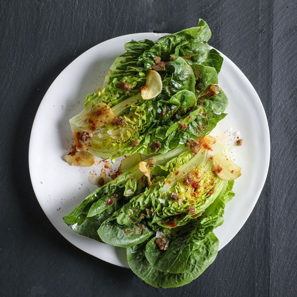 Little gems with warm garlic dressing