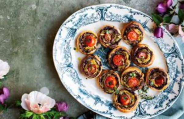 Little olive, onion, anchovy and tomato tarts