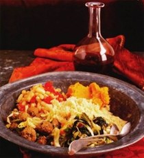 Livornese couscous with meatballs, white beans, and greens (Cuscussù alla Livornese)