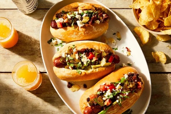 Loaded bacon-wrapped spicy hot dogs 