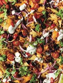 Loaded nachos and carrot cheese sauce