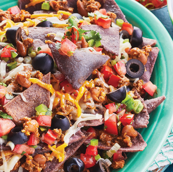 Loaded nachos with blue corn tortilla chips