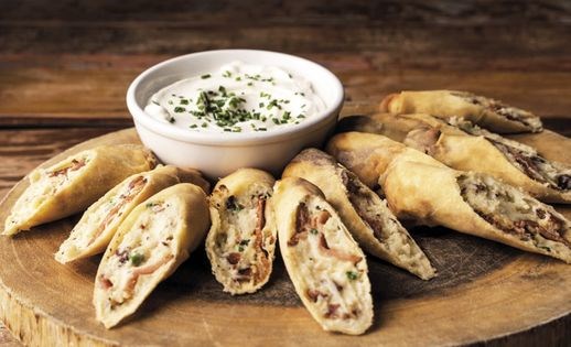 Loaded potato spring rolls with garlic sour cream