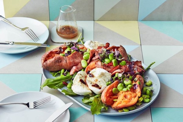 Loaded sweet potato with broad beans and chilli