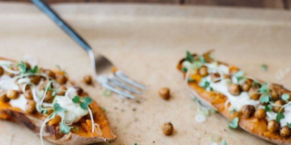 Loaded sweet potatoes with chickpea sour cream