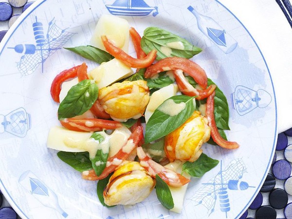 Lobster with tomato, potato and basil salad