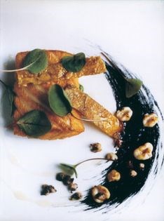 Loch Duart salmon with baby squid and crispy chicken skins
