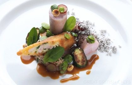 Loin of rabbit with rabbit spring roll and tomato couscous