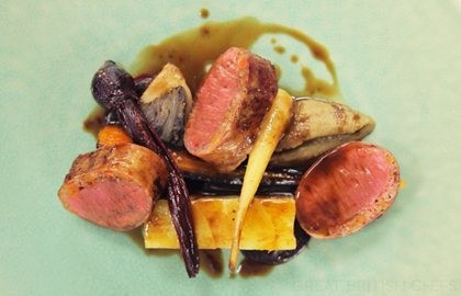 Loin of Welsh lamb, rump and potato terrine, aubergine purée, radicchio lettuce, and winter vegetables