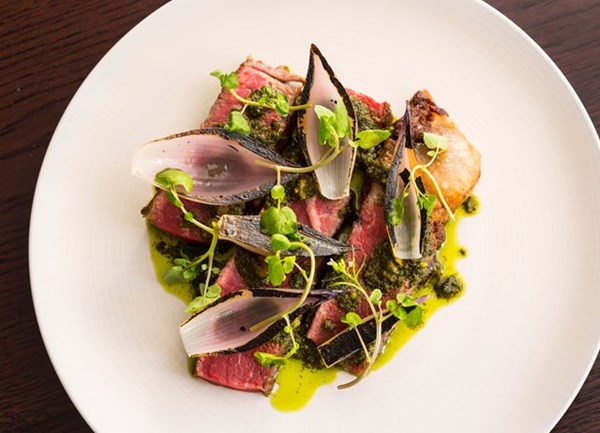 Longhorn beef sirloin, pickled walnut salsa verde and Tropea onions