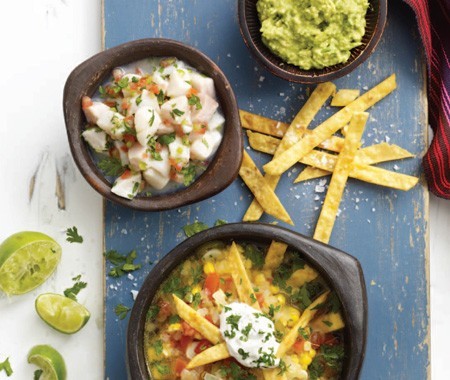 Los gatos ceviche, lime-tortilla soup, and guacamole with handmade chips