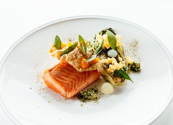 Low and slow fjord trout with tartare dressing, scraps, confit egg yolk and lemon
