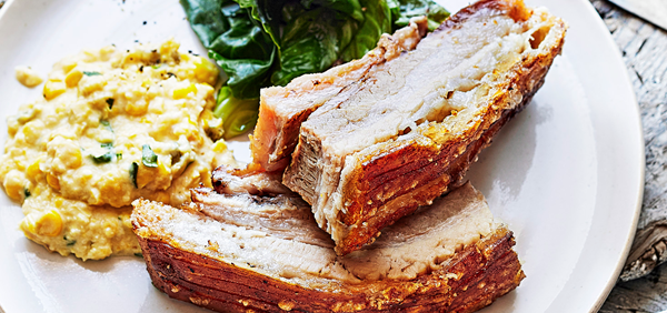Low and slow pork belly with jalapeño creamed corn