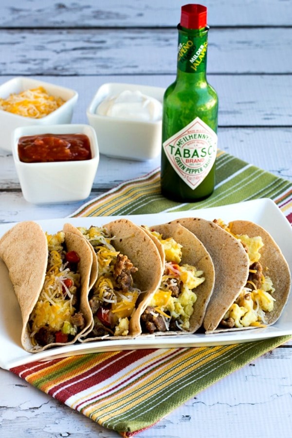 Low-carb breakfast tacos with sausage, peppers, and eggs