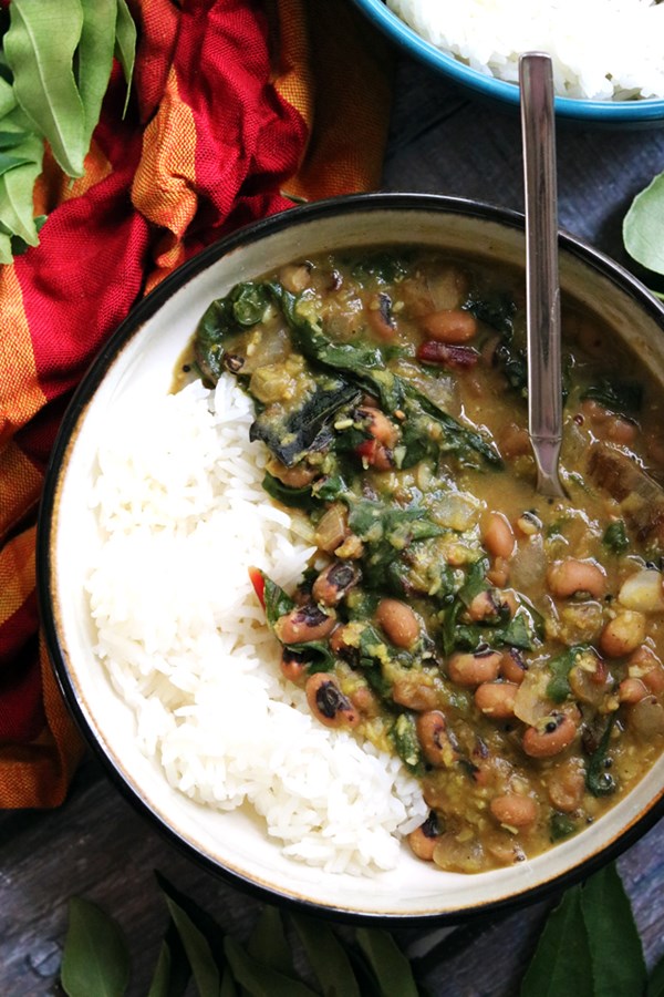 Lucky black-eyed peas, greens, and red lentil curry