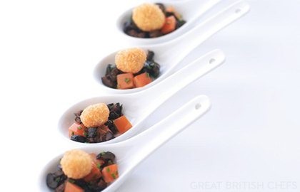 Macadamia nuts with black olives