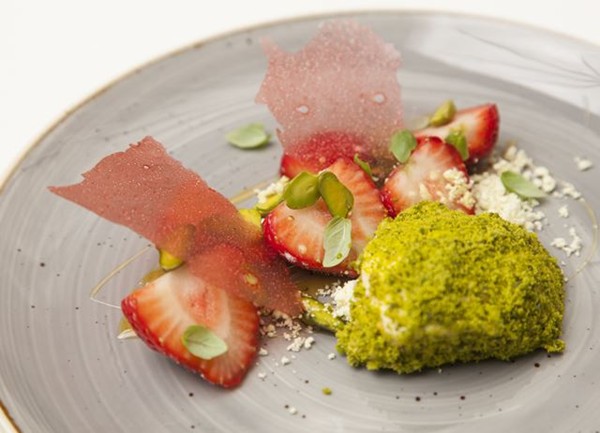 Macerated strawberries, yoghurt parfait, pistachio, basil
