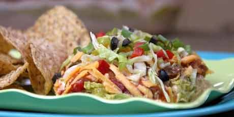Macho nacho dip [Colossal, multilayered Tex-Mex nacho dip]