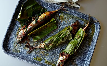 Mackerel in banana leaf with harissa and spinach