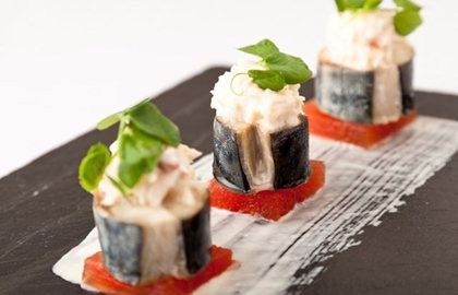 Mackerel with compressed watermelon, crab and horseradish salad