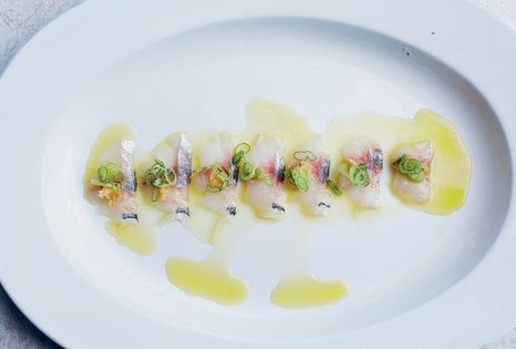 Mackerel with jalapeño vinegar, roasted garlic, toasted sesame & green onions