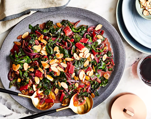 Madeira-braised Swiss chard with garam masala, sultanas, and toasted almonds