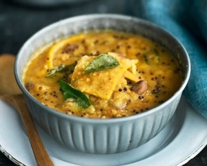 Madhur's dal dhokri split pea & tomato sauce with noodles
