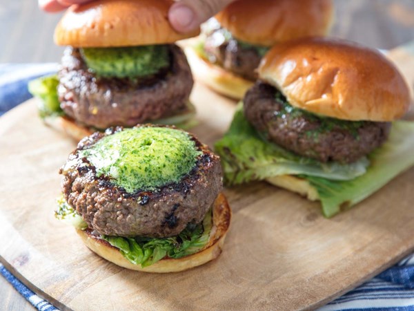 Maitre d'hotel butter burger with garlic confit and seared romaine 