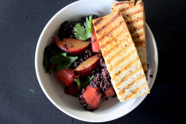 Make-ahead coconut forbidden rice with tofu and summer fruit