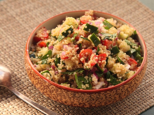 Make-ahead quinoa salad with cucumber, tomato, and herbs