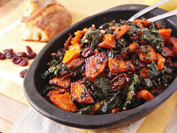 Make ahead roasted squash and kale salad with spiced nuts, cranberries, and maple vinaigrette 