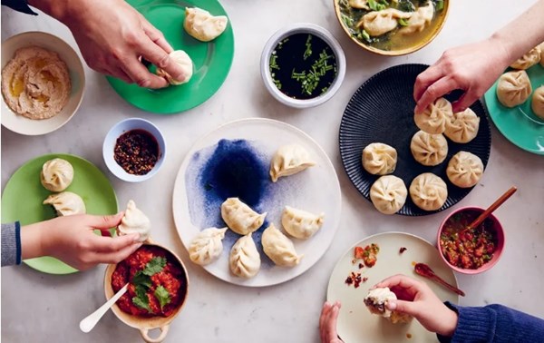 Making and eating momos