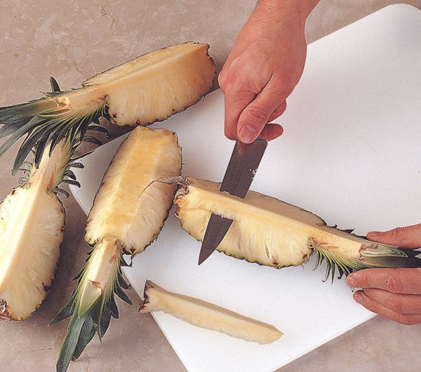 Making pineapple wedges