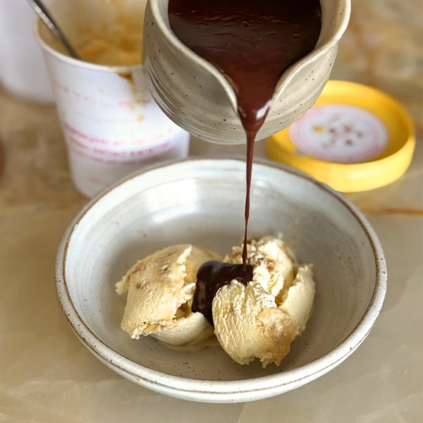 Malty chocolate fudge sauce and sesame sprinkle
