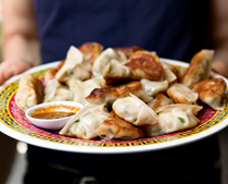 Mama Chang’s pork and chive dumplings with black pepper-scallion sauce 